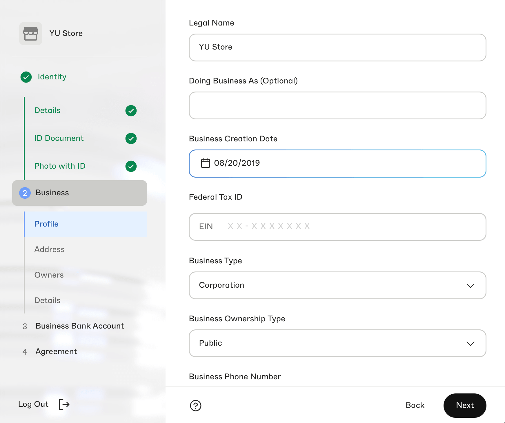 Merchant verification business profile form with legal name, tax ID, and business type fields